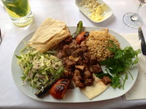 Diced Shish Kebab - lamb pieces with grilled tomatos and peppers, wheat rice, and pita bread